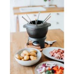 Dorre Fonda Fondue gjutjärnsgryta med akaciaträplatta