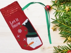 Flasköverdrag julmotiv snögubbe röd 30x13 cm universell storlek