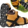 Gräsmatteluftare aeratorskor med 4,2 cm stålpiggar, justerbara remmar