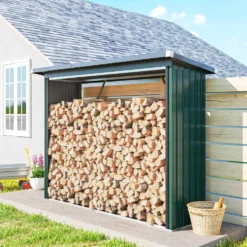 Vedbod i galvaniserat stål med upphöjd bas och sluttande tak 213x66,5x150 cm grön